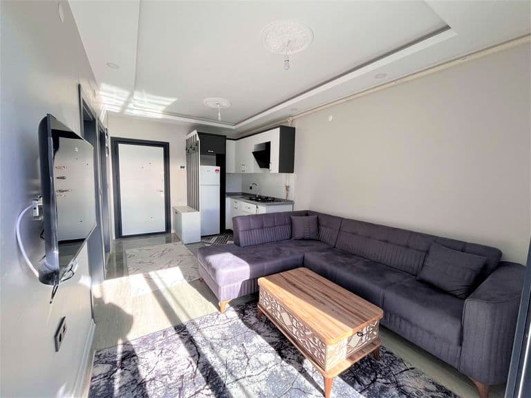 DORA - YENİKENTTE FULL EŞYALI ARA KAT 1+1 SIFIR DAİRE