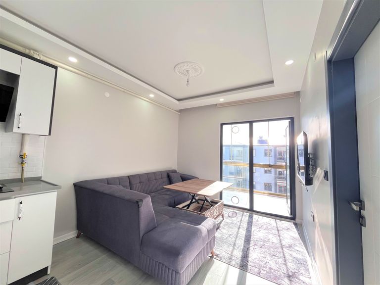 DORA - YENİKENTTE FULL EŞYALI ARA KAT 1+1 SIFIR DAİRE