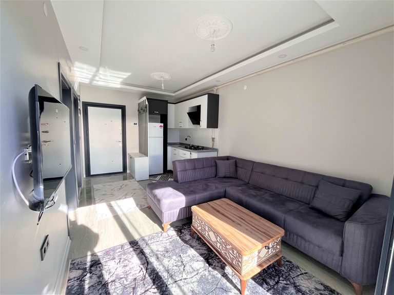 DORA - YENİKENTTE FULL EŞYALI ARA KAT 1+1 SIFIR DAİRE