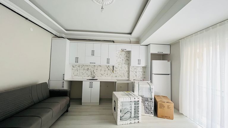 KADIZADE MAHALLESİNDE MERKEZİ KONUMDA SIFIR 1+1 KİRALIK DAİRE