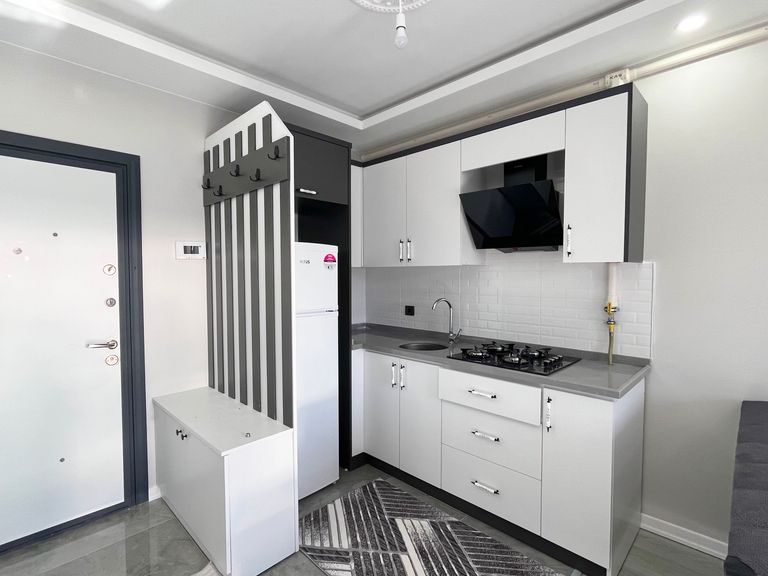DORA - YENİKENTTE FULL EŞYALI YATIRIMLIK 1+1 SIFIR DAİRE
