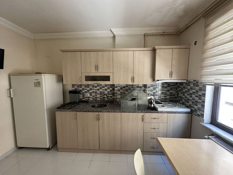 DORA’DAN GÜMÜŞHANE ÇARŞI MERKEZDE TAŞINMAYA HAZIR EŞYALI 1+1 KİRALIK DAİRE